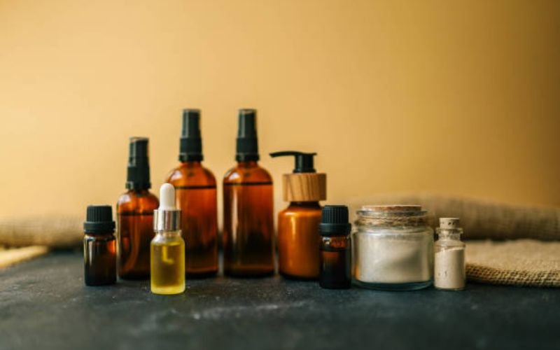 collection of oils, leave-in conditioners, and creams for daily use