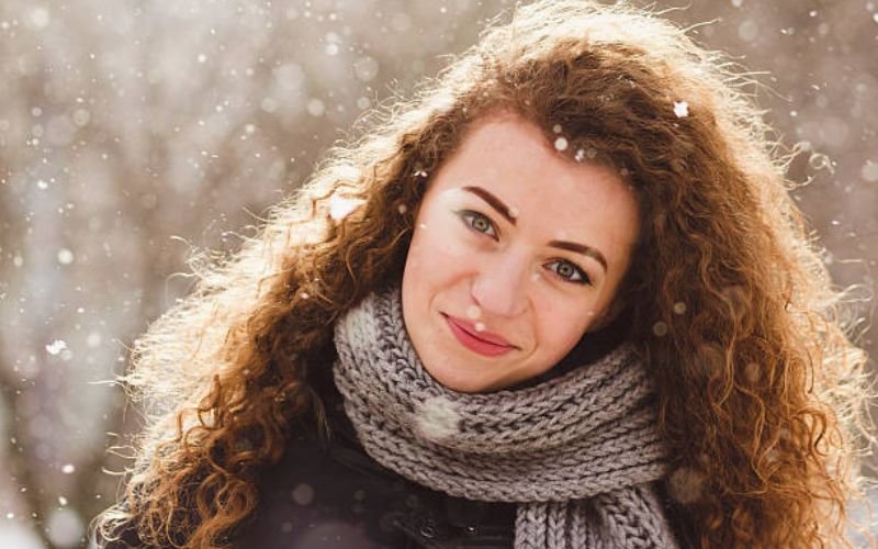 Hair protected with scarf and oils in cold winter