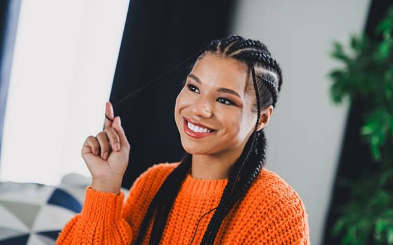 Black hair in braids with healthy moisturized scalp
