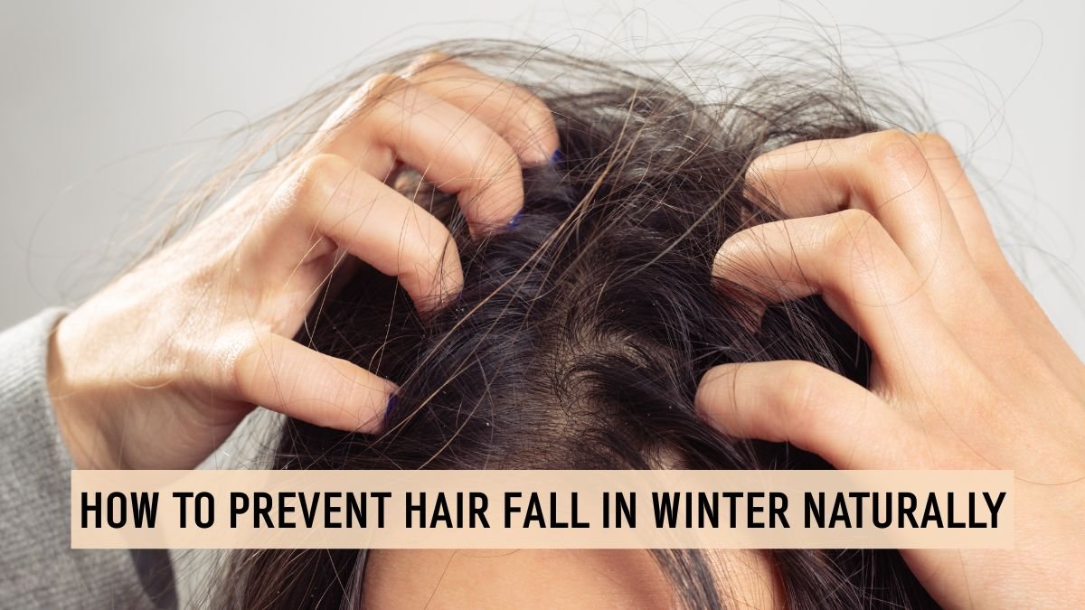 Woman massaging scalp with oil to prevent hair fall in winter